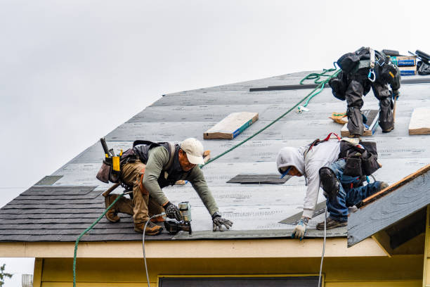 Professional Roofing technician working in Tomkins Cove, NY